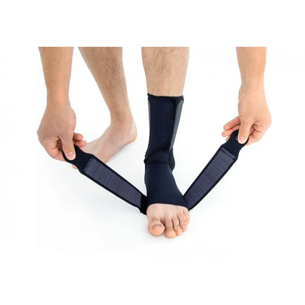 Releveur de pied avec deux rappels élastiques croisés