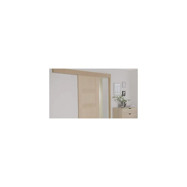 Système coulissant avec habillage pour porte en bois